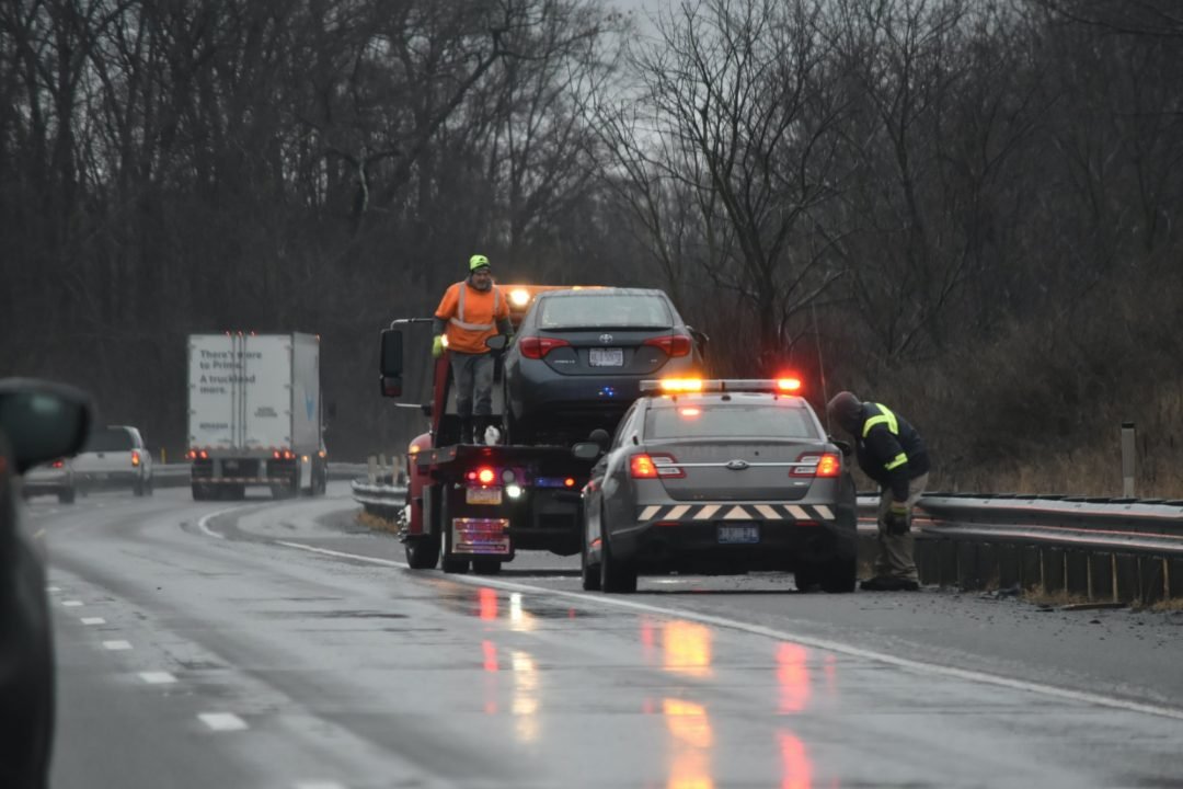 Two cars parked on the roadside awaiting emergency tow truck for vehicle recovery services in Crestwood,IL. Two cars parked on the roadside awaiting emergency tow truck for vehicle recovery services in Crestwood,IL.
